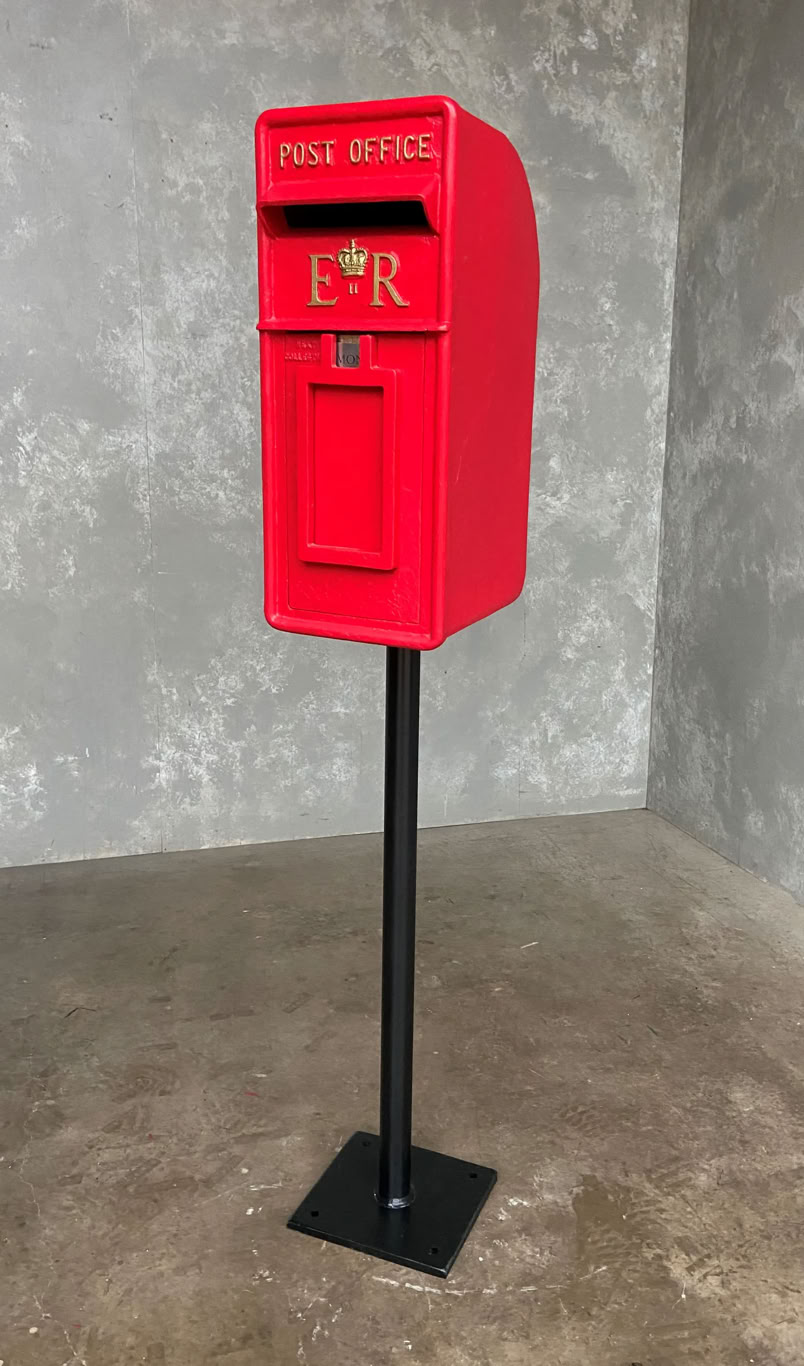 Original British letter box on a metal stand
