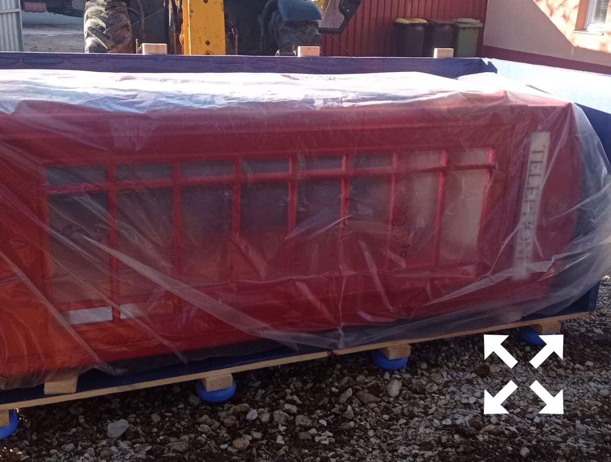 A phone kiosk that is being unpacked.